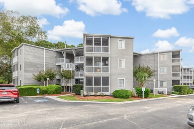 Stylish 2 bedroom, 2 bath condo in the heart of downtown on Carolina Shores Golf Course in North Carolina - for sale on GolfHomes.com, golf home, golf lot