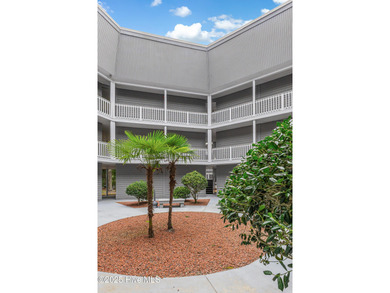 Stylish 2 bedroom, 2 bath condo in the heart of downtown on Carolina Shores Golf Course in North Carolina - for sale on GolfHomes.com, golf home, golf lot