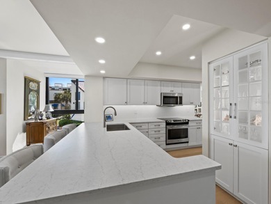 Set in one of Fairway Bay's most desirable corner locations on Longboat Key Golf Club Resort in Florida - for sale on GolfHomes.com, golf home, golf lot