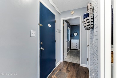 Stylish 2 bedroom, 2 bath condo in the heart of downtown on Carolina Shores Golf Course in North Carolina - for sale on GolfHomes.com, golf home, golf lot