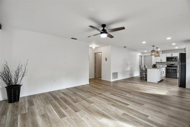 Rarely available! Remodeled Ground floor, single story end unit on IMG Academies Golf and Country Club in Florida - for sale on GolfHomes.com, golf home, golf lot