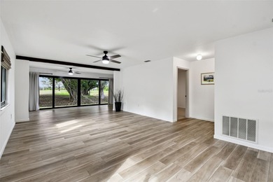 Rarely available! Remodeled Ground floor, single story end unit on IMG Academies Golf and Country Club in Florida - for sale on GolfHomes.com, golf home, golf lot