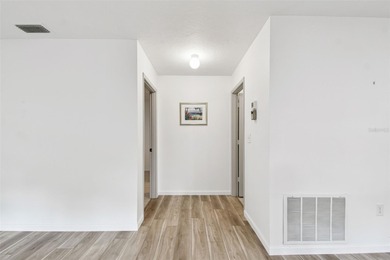 Rarely available! Remodeled Ground floor, single story end unit on IMG Academies Golf and Country Club in Florida - for sale on GolfHomes.com, golf home, golf lot