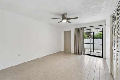 Rarely available! Remodeled Ground floor, single story end unit on IMG Academies Golf and Country Club in Florida - for sale on GolfHomes.com, golf home, golf lot