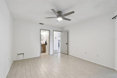 Rarely available! Remodeled Ground floor, single story end unit on IMG Academies Golf and Country Club in Florida - for sale on GolfHomes.com, golf home, golf lot