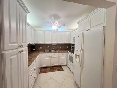 NEW A/C! HIGHLY DESIRABLE BUILDING LOCATED NEAR THE CLUBHOUSE on Hillsboro Pines Golf in Florida - for sale on GolfHomes.com, golf home, golf lot