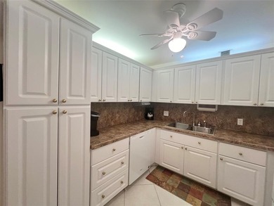 NEW A/C! HIGHLY DESIRABLE BUILDING LOCATED NEAR THE CLUBHOUSE on Hillsboro Pines Golf in Florida - for sale on GolfHomes.com, golf home, golf lot