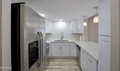 Beautifully remodeled 3-bedroom, 2-bath, two-story townhome! on Fountain of the Sun Country Club in Arizona - for sale on GolfHomes.com, golf home, golf lot