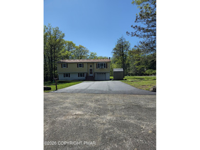 Welcome to 102 Tulip Trail, nestled in the sought-after Pocono on Pocono Farms Country Club in Pennsylvania - for sale on GolfHomes.com, golf home, golf lot