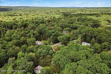 Welcome to 102 Tulip Trail, nestled in the sought-after Pocono on Pocono Farms Country Club in Pennsylvania - for sale on GolfHomes.com, golf home, golf lot
