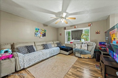 Welcome to 102 Tulip Trail, nestled in the sought-after Pocono on Pocono Farms Country Club in Pennsylvania - for sale on GolfHomes.com, golf home, golf lot