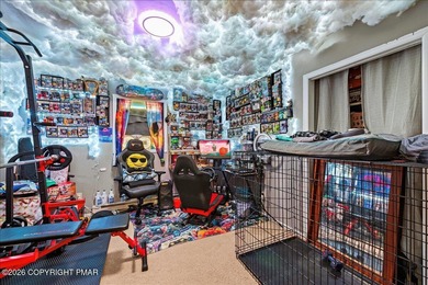 Welcome to 102 Tulip Trail, nestled in the sought-after Pocono on Pocono Farms Country Club in Pennsylvania - for sale on GolfHomes.com, golf home, golf lot