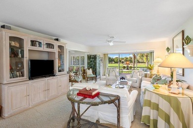 Discover the charm of this inviting 3-bedroom, 2-bathroom home on Quail Ridge Golf Course and Country Club in Florida - for sale on GolfHomes.com, golf home, golf lot