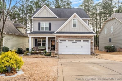 This stunning three-story, four-bedroom, 2.5-bath home in the on Anderson Creek Golf Club in North Carolina - for sale on GolfHomes.com, golf home, golf lot