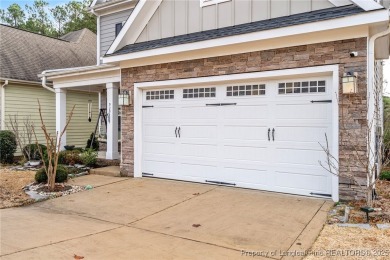 This stunning three-story, four-bedroom, 2.5-bath home in the on Anderson Creek Golf Club in North Carolina - for sale on GolfHomes.com, golf home, golf lot