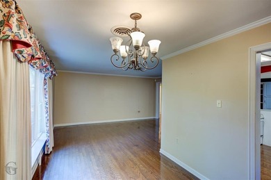 Welcome to 1306 East Todd, a spacious and well-loved home that's on Pine Hills Country Club in Louisiana - for sale on GolfHomes.com, golf home, golf lot