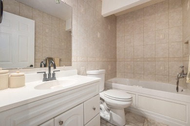 Welcome home to this beautifully remodeled 4-bedroom, 3-bath on Lakes of the Four Seasons Country Club in Indiana - for sale on GolfHomes.com, golf home, golf lot