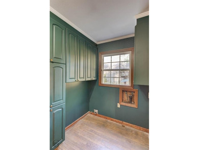 Welcome to 1306 East Todd, a spacious and well-loved home that's on Pine Hills Country Club in Louisiana - for sale on GolfHomes.com, golf home, golf lot