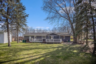 Welcome home to this beautifully remodeled 4-bedroom, 3-bath on Lakes of the Four Seasons Country Club in Indiana - for sale on GolfHomes.com, golf home, golf lot