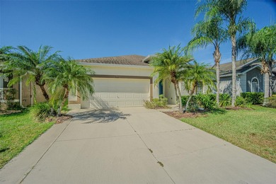 THIS HOME WILL BE GETTING A NEW ROOF PRIOR TO CLOSING! This on Tampa Bay Golf and Country Club in Florida - for sale on GolfHomes.com, golf home, golf lot