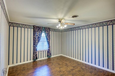 Welcome to 1306 East Todd, a spacious and well-loved home that's on Pine Hills Country Club in Louisiana - for sale on GolfHomes.com, golf home, golf lot