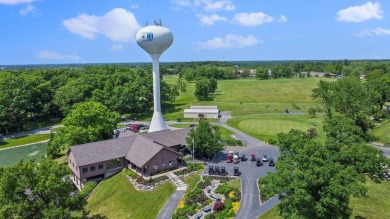 Welcome home to this beautifully remodeled 4-bedroom, 3-bath on Lakes of the Four Seasons Country Club in Indiana - for sale on GolfHomes.com, golf home, golf lot