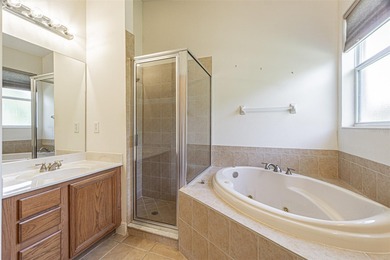 THIS HOME WILL BE GETTING A NEW ROOF PRIOR TO CLOSING! This on Tampa Bay Golf and Country Club in Florida - for sale on GolfHomes.com, golf home, golf lot