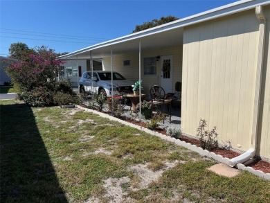 Situated within the picturesque landscape of Palm Hill Country on Palm Hill Golf Club in Florida - for sale on GolfHomes.com, golf home, golf lot