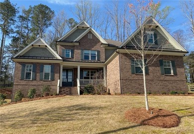 Gorgeous three-sided brick home with an open floor plan and on Woodmont Golf and Country Club in Georgia - for sale on GolfHomes.com, golf home, golf lot