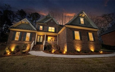 Gorgeous three-sided brick home with an open floor plan and on Woodmont Golf and Country Club in Georgia - for sale on GolfHomes.com, golf home, golf lot