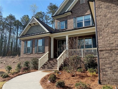 Gorgeous three-sided brick home with an open floor plan and on Woodmont Golf and Country Club in Georgia - for sale on GolfHomes.com, golf home, golf lot