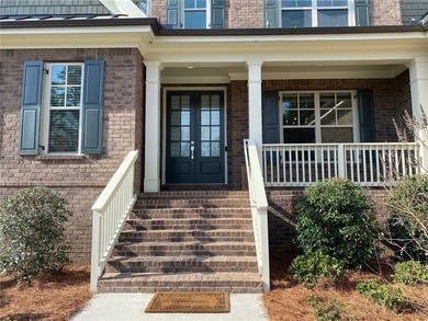 Gorgeous three-sided brick home with an open floor plan and on Woodmont Golf and Country Club in Georgia - for sale on GolfHomes.com, golf home, golf lot