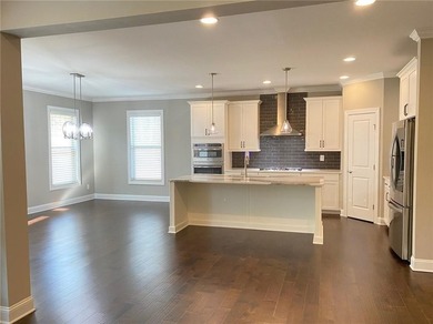 Gorgeous three-sided brick home with an open floor plan and on Woodmont Golf and Country Club in Georgia - for sale on GolfHomes.com, golf home, golf lot