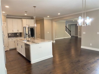 Gorgeous three-sided brick home with an open floor plan and on Woodmont Golf and Country Club in Georgia - for sale on GolfHomes.com, golf home, golf lot