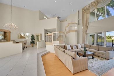 Stunning custom-built 5-bedroom, 4.5-bath lakefront pool home in on TPC Eagle Trace in Florida - for sale on GolfHomes.com, golf home, golf lot