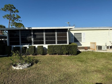 This lovely, manufactured home is in Lake Fairways Country Club on Pine Lakes Country Club in Florida - for sale on GolfHomes.com, golf home, golf lot