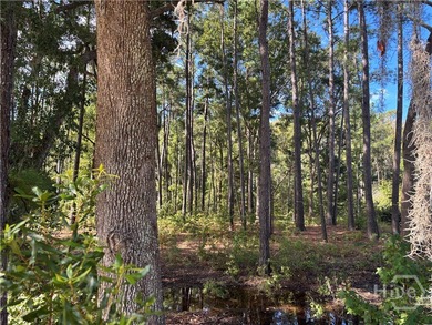 Discover a rare opportunity to own 121 feet of peaceful lagoon on Savannah Quarters Country Club in Georgia - for sale on GolfHomes.com, golf home, golf lot
