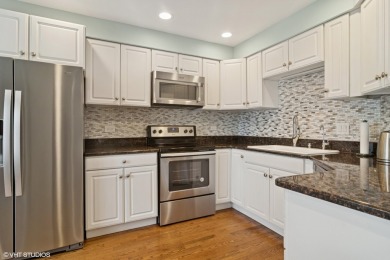 This end unit townhouse has been recently updated throughout on Pine Meadow Golf Club in Illinois - for sale on GolfHomes.com, golf home, golf lot