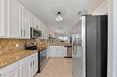 Rare Opportunity: Expansive Top-Floor End Unit with Breathtaking on River Strand Golf and Country Club At Heritage Harbour  in Florida - for sale on GolfHomes.com, golf home, golf lot