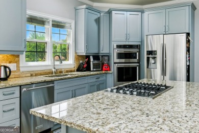 Experience resort-style living in this executive home, perfectly on Hamilton Mill Golf Club in Georgia - for sale on GolfHomes.com, golf home, golf lot