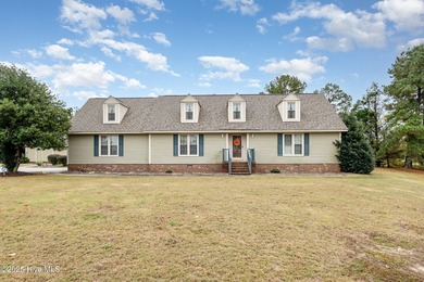 5.09 percent Assumable VA with Roam! Upgraded roof (2022) and a on Sandy Ridge Country Club in North Carolina - for sale on GolfHomes.com, golf home, golf lot