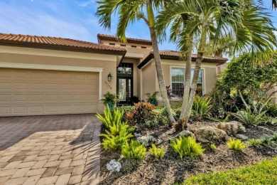 Resort-Style Living Awaits in This Stunning Waterfront Home! on Riverwood Golf Club in Florida - for sale on GolfHomes.com, golf home, golf lot