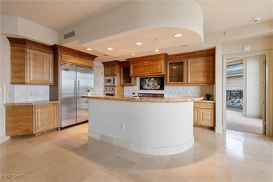 Step into effortless luxury at One Queensridge Place, the on Badlands Golf Club in Nevada - for sale on GolfHomes.com, golf home, golf lot