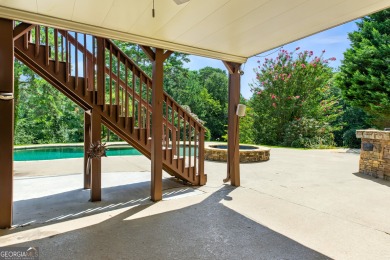 Experience resort-style living in this executive home, perfectly on Hamilton Mill Golf Club in Georgia - for sale on GolfHomes.com, golf home, golf lot