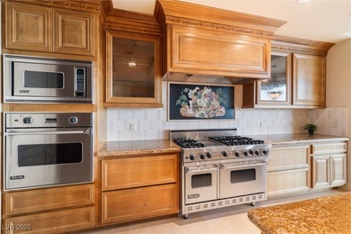 Step into effortless luxury at One Queensridge Place, the on Badlands Golf Club in Nevada - for sale on GolfHomes.com, golf home, golf lot