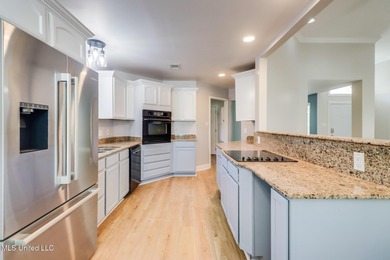 This home is centally located in Timber Ridge known for it's on Pass Christian Isles Golf Club in Mississippi - for sale on GolfHomes.com, golf home, golf lot