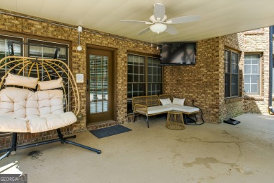 Experience resort-style living in this executive home, perfectly on Hamilton Mill Golf Club in Georgia - for sale on GolfHomes.com, golf home, golf lot