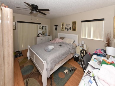 RARE HALF DUPLEX WITH PRIVATE BACKYARD! This 2-bedroom on Cypress Lakes Golf Course - West Palm Beach in Florida - for sale on GolfHomes.com, golf home, golf lot