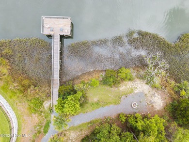 Nestled within the sought-after community of Tidewater at Ocean on Brick Landing Plantation Yacht and Golf Club in North Carolina - for sale on GolfHomes.com, golf home, golf lot