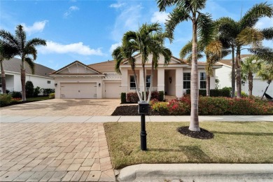 Welcome to 5316 Fishersound Lane, a custom-built 3-bedroom on Apollo Beach Golf and Sea Club in Florida - for sale on GolfHomes.com, golf home, golf lot